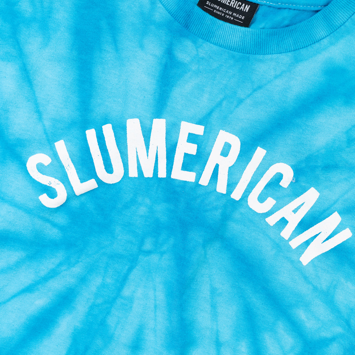 YOUTH BLUE CURVED TEE